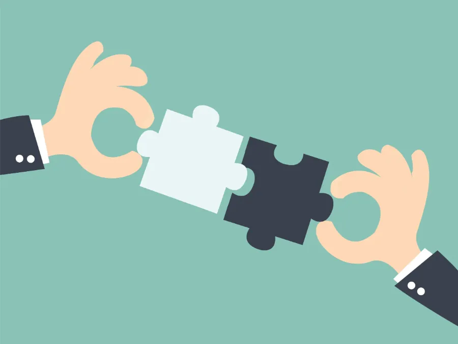 Illustration of two hands joining puzzle pieces